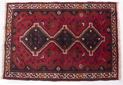 Lot 343 - A MIDDLE EASTERN RED GROUND RUG