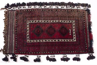 Lot 354 - A MIDDLE EASTERN TRIBAL SADDLE BAG