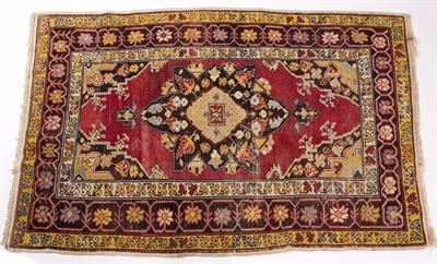 Lot 369 - A TURKISH BRICK RED GROUND RUG