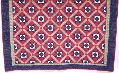 Lot 415 - AN AMERICAN PATCHWORK QUILT