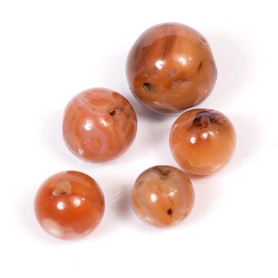 Lot 426 - FIVE ANTIQUE CHINESE CARNELIAN BEADS