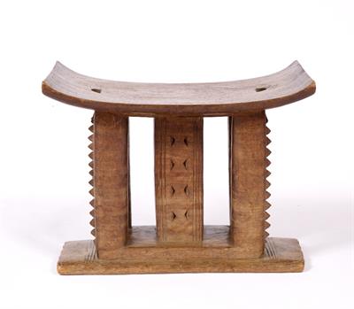 Lot 445 - AN ASHANTI WOODEN STOOL