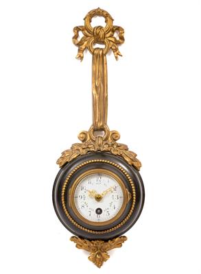Lot 34 - AN EARLY 20TH CENTURY GILT AND PATINATED BRONZE CARTEL TIMEPIECE