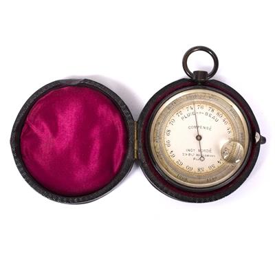 Lot 110 - A FRENCH BRASS CASED POCKET BAROMETER