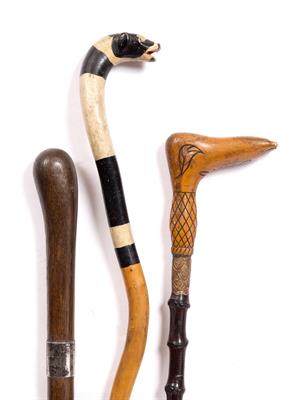 Lot 135 - TWO FOLK ART WOODEN CANES