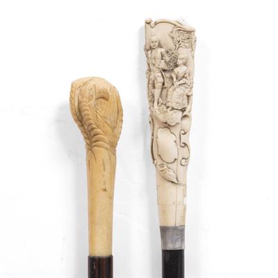 Lot 137 - AN ANTIQUE CARVED IVORY AND EBONISED CANE