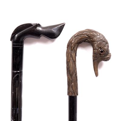 Lot 139 - AN INDIAN CARVED EBONY CANE