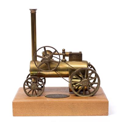 Lot 158 - A BRASS MODEL