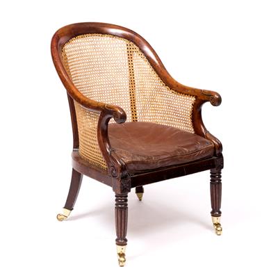 Lot 161 - A GEORGE IV MAHOGANY BERGERE LIBRARY CHAIR