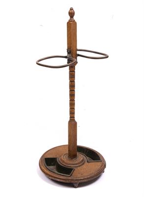 Lot 187 - A LATE VICTORIAN OAK AND BRASS STICK STAND