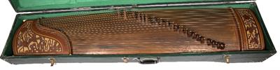 Lot 276 - A CHINESE HARDWOOD AND BONE MOUNTED TWENTY-ONE STRING ZITHER (GUZHENG)