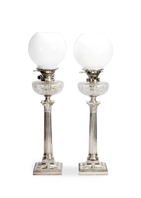 Lot 8 - A PAIR OF 19TH CENTURY OIL LAMPS with globular white glass shades supported on Hinks patent duplex b