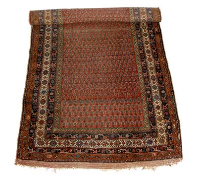 Lot 18 - A HAMADAN BRICK GROUND RUNNER with central dense geometric decoration within a multiple banded geome