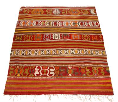Lot 19 - A TURKISH KELIM with bands of stylised flower and stripe decoration in reds