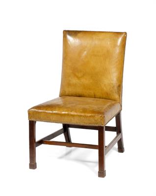 Lot 20 - A GEORGIAN MAHOGANY LIBRARY CHAIR with brown leather upholstery to the back and seats and standing o