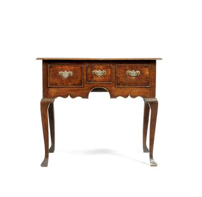 Lot 42 - A GEORGE III OAK LOW BOY