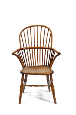 Lot 48 - A 19TH CENTURY YEW AND ELM WINDSOR HIGH STICK BACK ARMCHAIR with carved saddle seat
