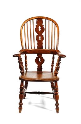 Lot 49 - A VICTORIAN HIGH BACKED YEW AND ELM SMOKERS BOW WINDSOR ARMCHAIR with pierced vase shaped splats and