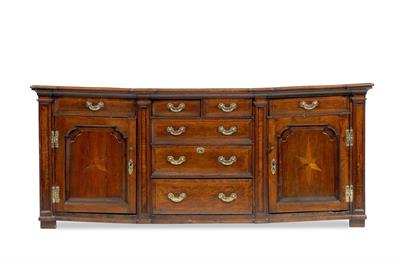 Lot 80 - A GEORGE III OAK BREAKFRONT DRESSER BASE with plank top