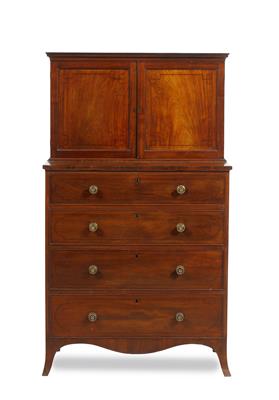 Lot 84 - A REGENCY MAHOGANY CABINET CHEST the twin panelled cupboard doors above decorated with ebony stringi