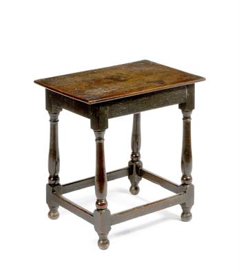 Lot 108 - AN ANTIQUE OAK RECTANGULAR SIDE TABLE of pegged construction on baluster turned legs united by stret