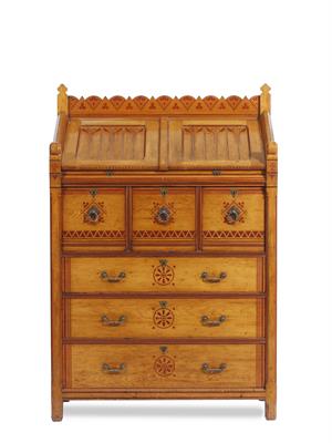 Lot 111 - A VICTORIAN GOTHIC REVIVAL PITCH PINE CHEST OF DRAWERS by 'Holland & Sons'  in the manner of Charles