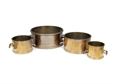 Lot 131 - A GRADUATED SET OF FOUR GEORGE III GUN METAL GRAIN MEASURES each with turned decoration