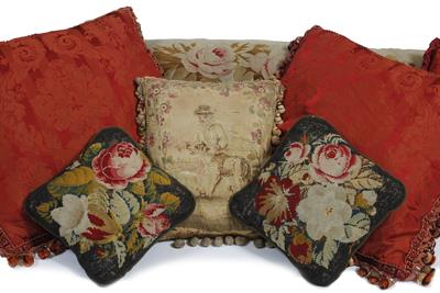 Lot 198 - A FRENCH 19TH CENTURY AUBUSSON ROSE DECORATED BOLSTER CUSHION