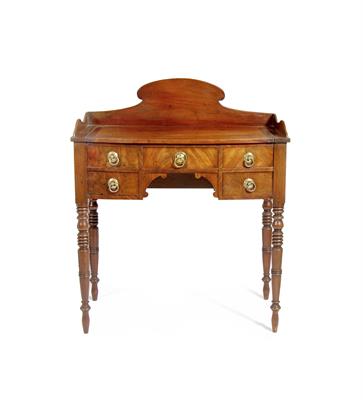 Lot 206 - A GEORGE IV MAHOGANY BOW FRONTED KNEEHOLE DRESSING TABLE with shaped galleried back and hinged top a