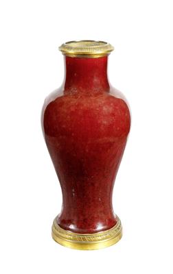 Lot 213 - AN ANTIQUE CHINESE PORCELAIN VASE of inverted baluster form and glazed in ox blood red with ormolu m