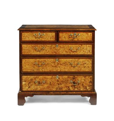 Lot 217 - A GEORGE III BURR WALNUT AND MAHOGANY BANDED VENEERED CHEST of two short and three long drawers with