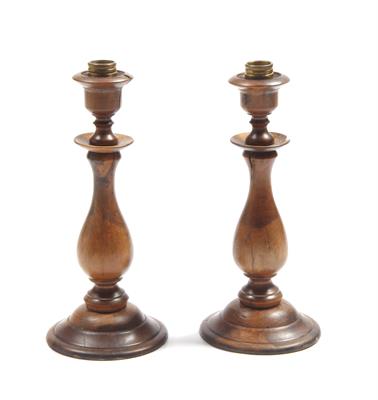 Lot 253 - A PAIR OF TURNED YEW WOOD CANDLESTICKS with brass candle sockets