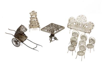 Lot 281 - A COLLECTION OF SILVER FILIGREE MINIATURE DOLLS HOUSE FURNITURE to include a settee