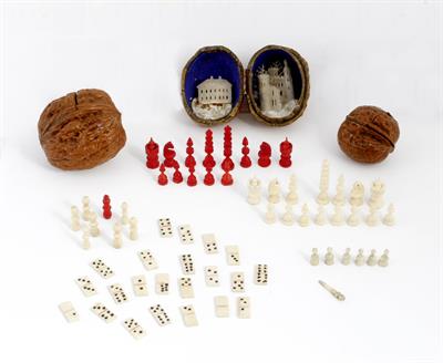 Lot 292 - A MINIATURE TURNED BONE CHESS SET within an old walnut shell