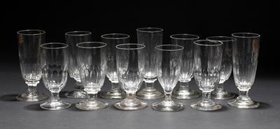 Lot 328 - A GROUP OF TWELVE STRAIGHT SIDED WINE GLASSES with moulded bases to the bowls