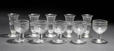 Lot 336 - A GROUP OF FIVE CUT GLASS HEAVY SALTS 10cm high together with a set of five cut glass syllabub glass