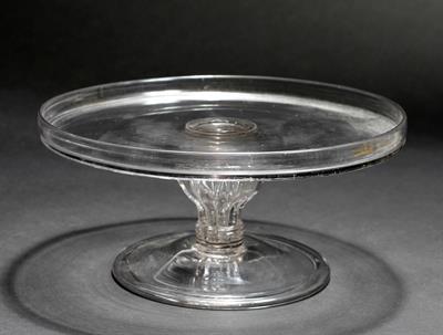 Lot 337 - A 19TH CENTURY GLASS FOOTED TAZZA with moulded hollow stem 26cm diameter x 12.5cm high