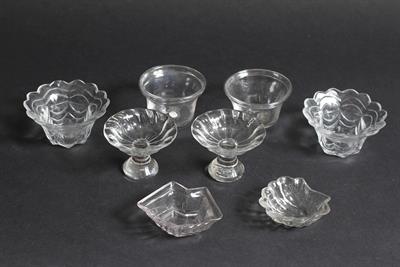 Lot 342 - A PAIR OF ANTIQUE GLASS PATTY PANS with folded rims 7cm diameter