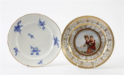 Lot 355 - A SEVRES PORCELAIN PLATE decorated with sprays of flowers and within a wavy gilt line border with ty