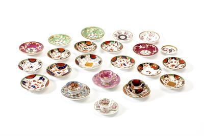 Lot 358 - A GROUP OF MINIATURE TEA CUPS and saucers together with a further quantity of miniature saucers (a l