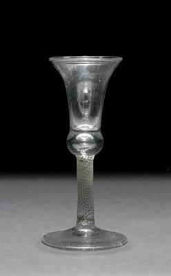 Lot 379 - AN 18TH CENTURY CORDIAL GLASS with flaring bell shaped bowl