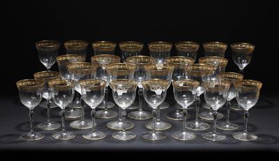 Lot 384 - A SUITE OF DRINKING GLASSES with gilded decoration consisting of eight champagne flutes