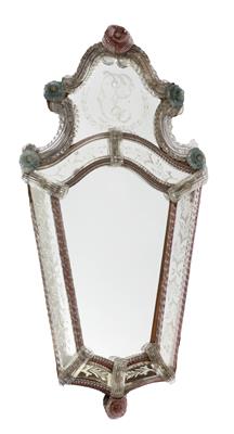 Lot 394 - A VENETIAN ENGRAVED AND SHAPED GLASS HANGING WALL MIRROR with red and blue glass rosette mounts