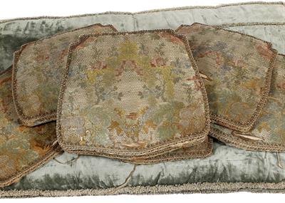 Lot 396 - SEVEN ANTIQUE METAL THREAD SHAPED SEAT CUSHIONS each 41cm wide together with three green velvet wind