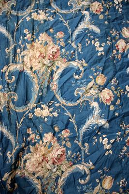 Lot 419 - A PAIR OF FRENCH BLUE GROUND CURTAINS decorated with acanthus leaf scrolls and a variety of flowers