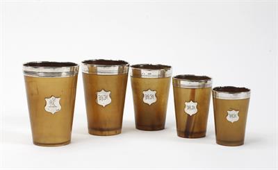 Lot 438 - A GROUP OF FOUR GRADUATED VICTORIAN HORN SILVER MOUNTED BEAKERS with shield shaped cartouches