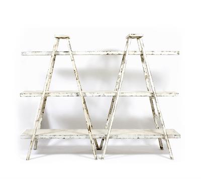 Lot 444 - A SET OF CONTEMPORARY WHITE PAINTED GRADUATING SHELVES with 'A' frame supports to either end 244cm w