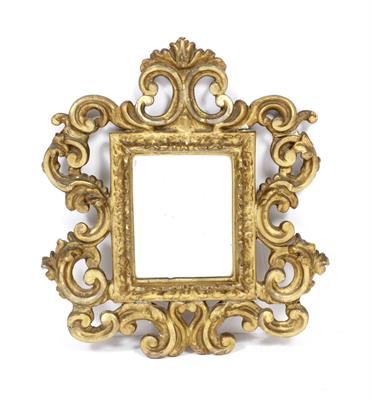 Lot 448 - AN ANTIQUE ITALIAN CARVED GILTWOOD FRAMED MIRROR