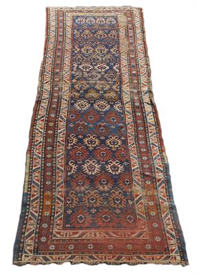 Lot 465 - AN ANTIQUE ORIENTAL BLUE GROUND RUNNER with floral motifs to the central field and within a multiple