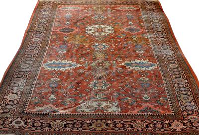 Lot 468 - AN ANTIQUE ORIENTAL BRICK GROUND SMALL CARPET the central field with stylised flowers and mustachieo